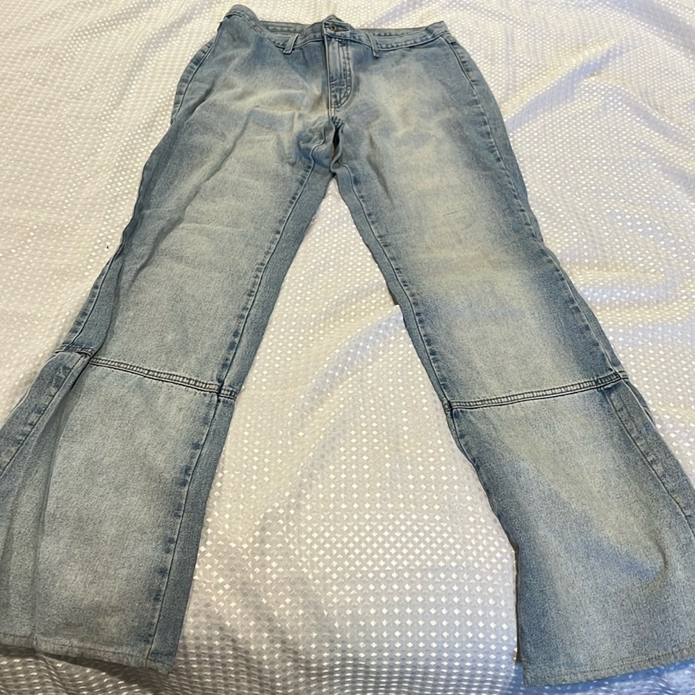 Distressed open flared jeans euro 42